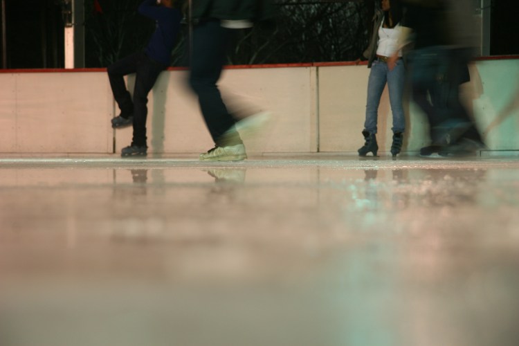 Homeless Man on the ice in Centinneal Park 